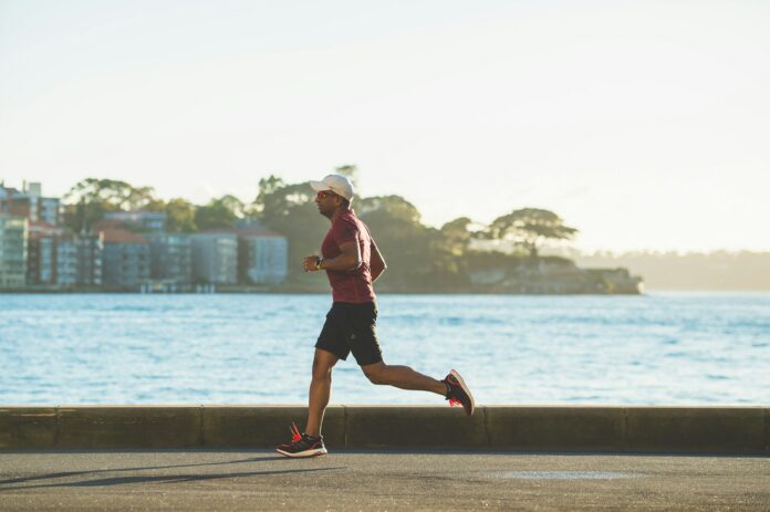 Photo by Chander R man running near sea during daytime