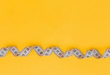 올바른 식습관과 운동을 통한 다이어트 silver and black necklace on yellow textile