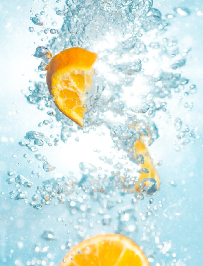 Photo by Jamie Street sliced orange fruits underwater