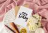 “일상 속 웰니스 문화, 작은 변화에서 시작된다” enjoy today poster on white basket beside bowl of food